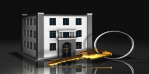 Large Key With Commercial Building Graphic